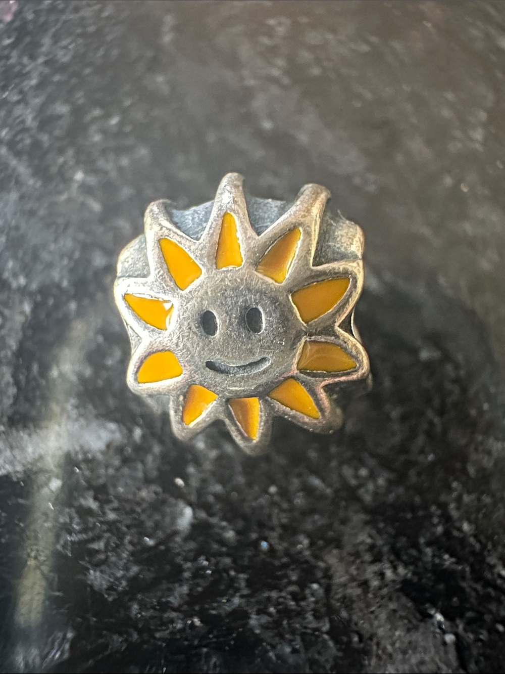 Authentic, retired Pandora "Smiling Sun" charm